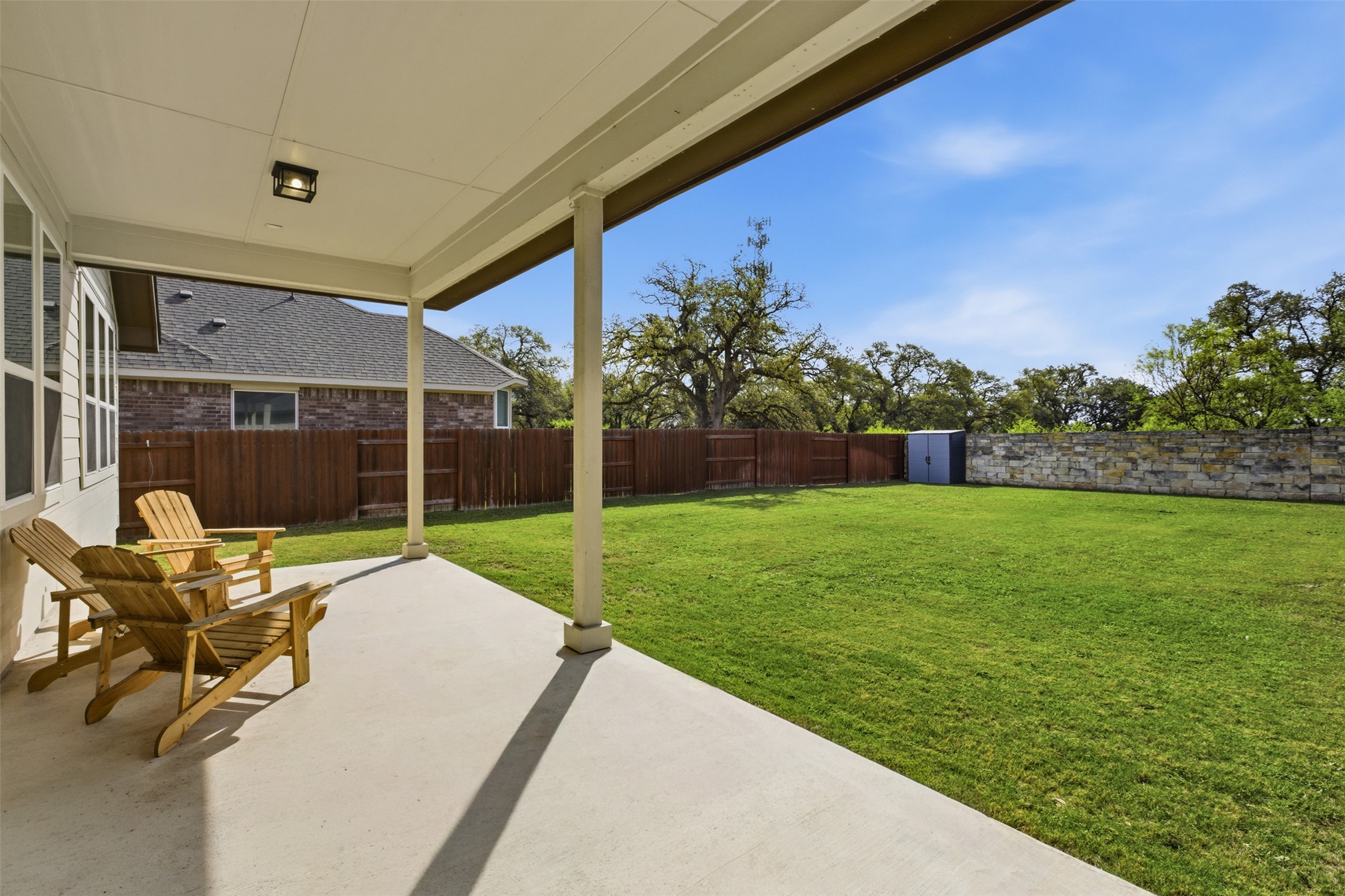 117 Old Trinity Way Georgetown, TX 78628 - Photo 2 of 38 Fenced backyard with a patio