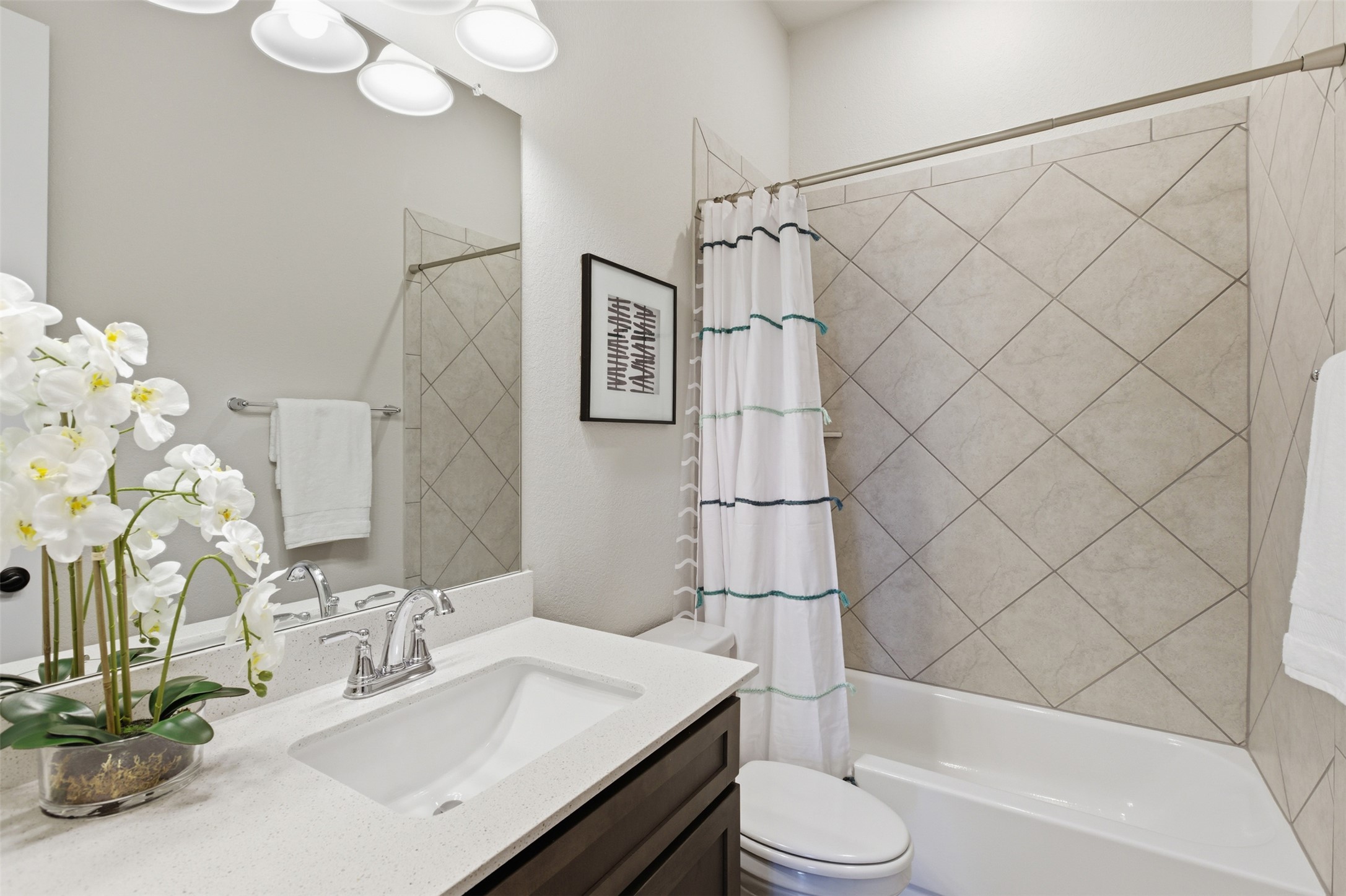 117 Old Trinity Way Georgetown, TX 78628 - Photo 26 of 38 Bathroom featuring vanity and shower / bath combination with curtain