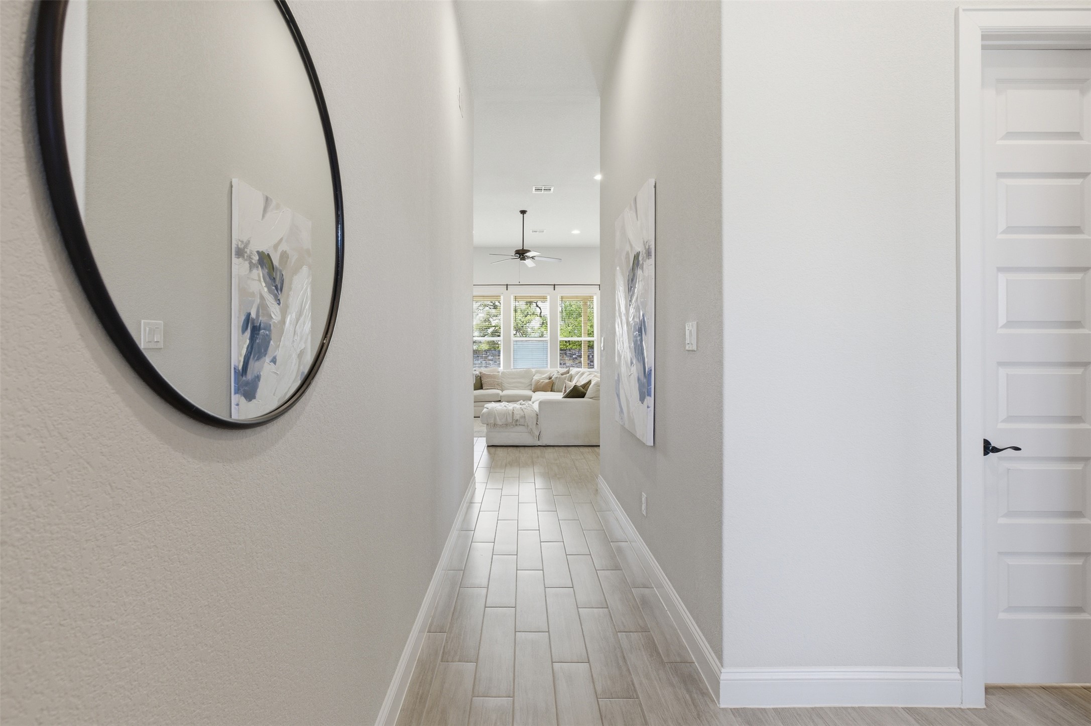 117 Old Trinity Way Georgetown, TX 78628 - Photo 10 of 38 Hall with wood finish floors and recessed lighting