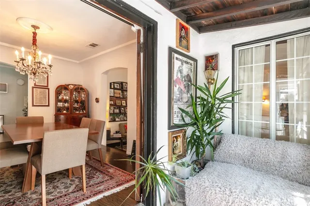 a view of a livingroom with furniture and window