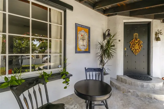 a view of a porch with furniture