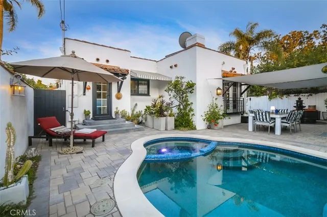 a view of a swimming pool with a patio