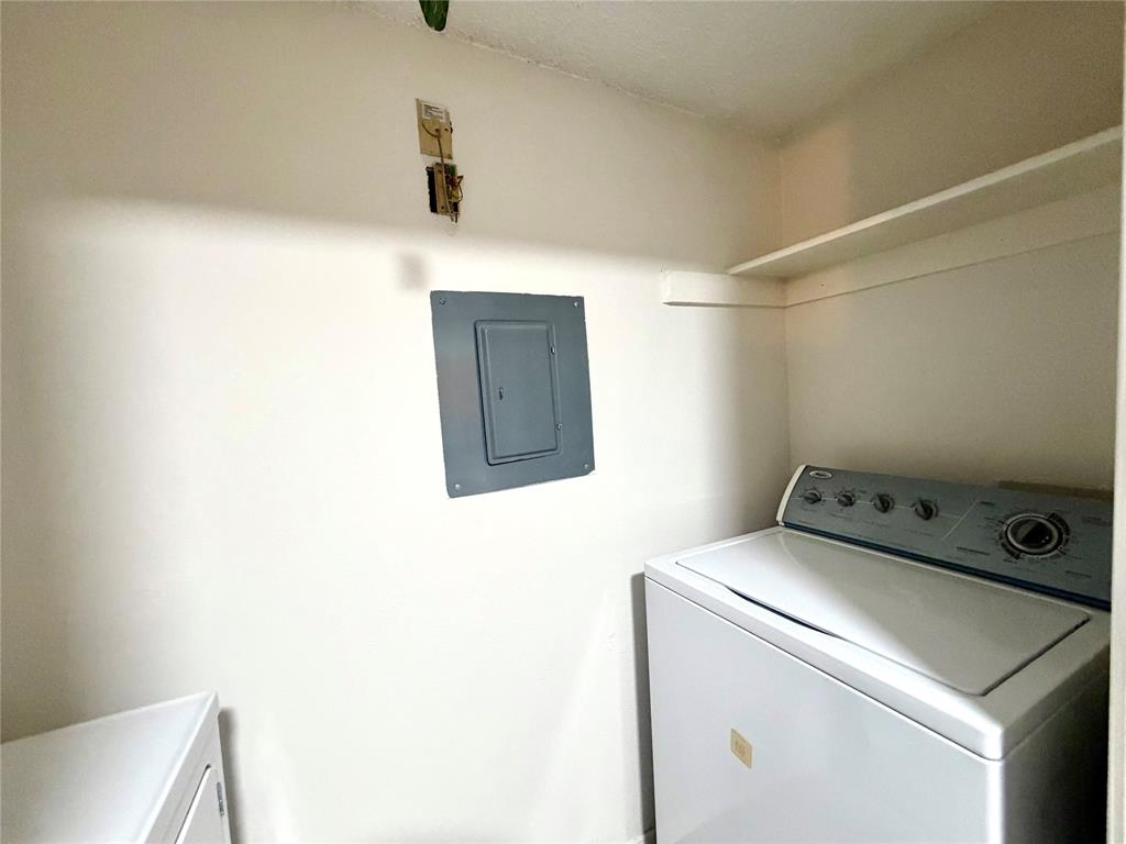 18333 Roehampton Drive, Unit 624 Dallas, TX 75252 - Photo 24 of 39 a utility room with dryer and washer