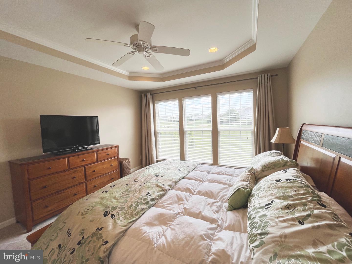 615 Prizer Court Downingtown, PA 19335 - Photo 11 of 35 a bedroom with a bed and a flat screen tv