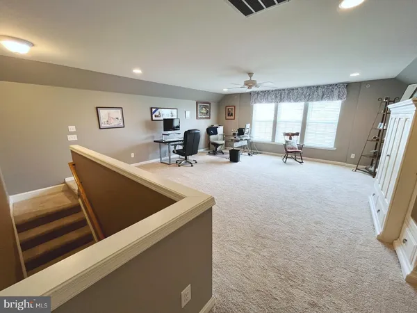 a view of a room with gaming equipment