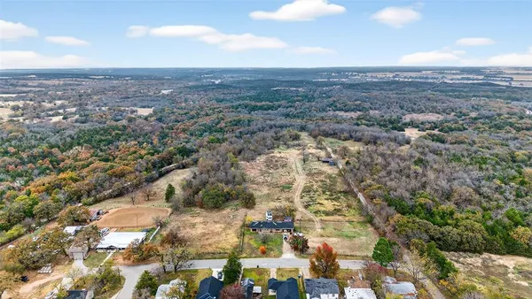 an aerial view of residential building and green space