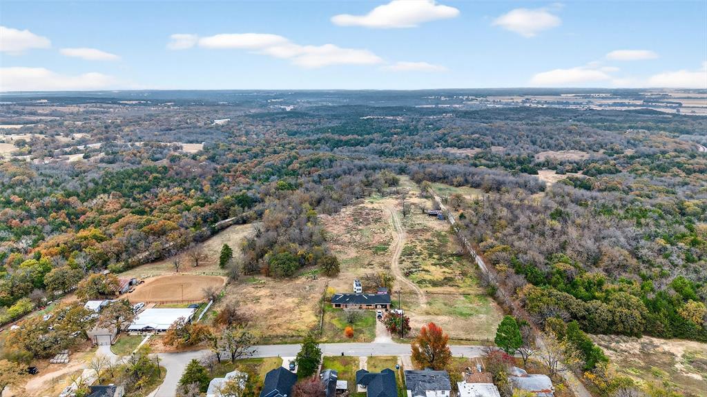 515 East Parnell Street Denison, TX 75021 - Photo 2 of 11 an aerial view of residential building and green space