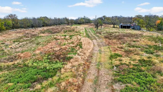a view of a yard with an outdoor space