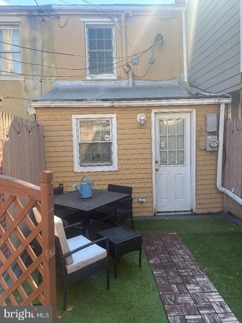 232 East Barney Street Baltimore, MD 21230 - Photo 14 of 23 a backyard of a house with seating space