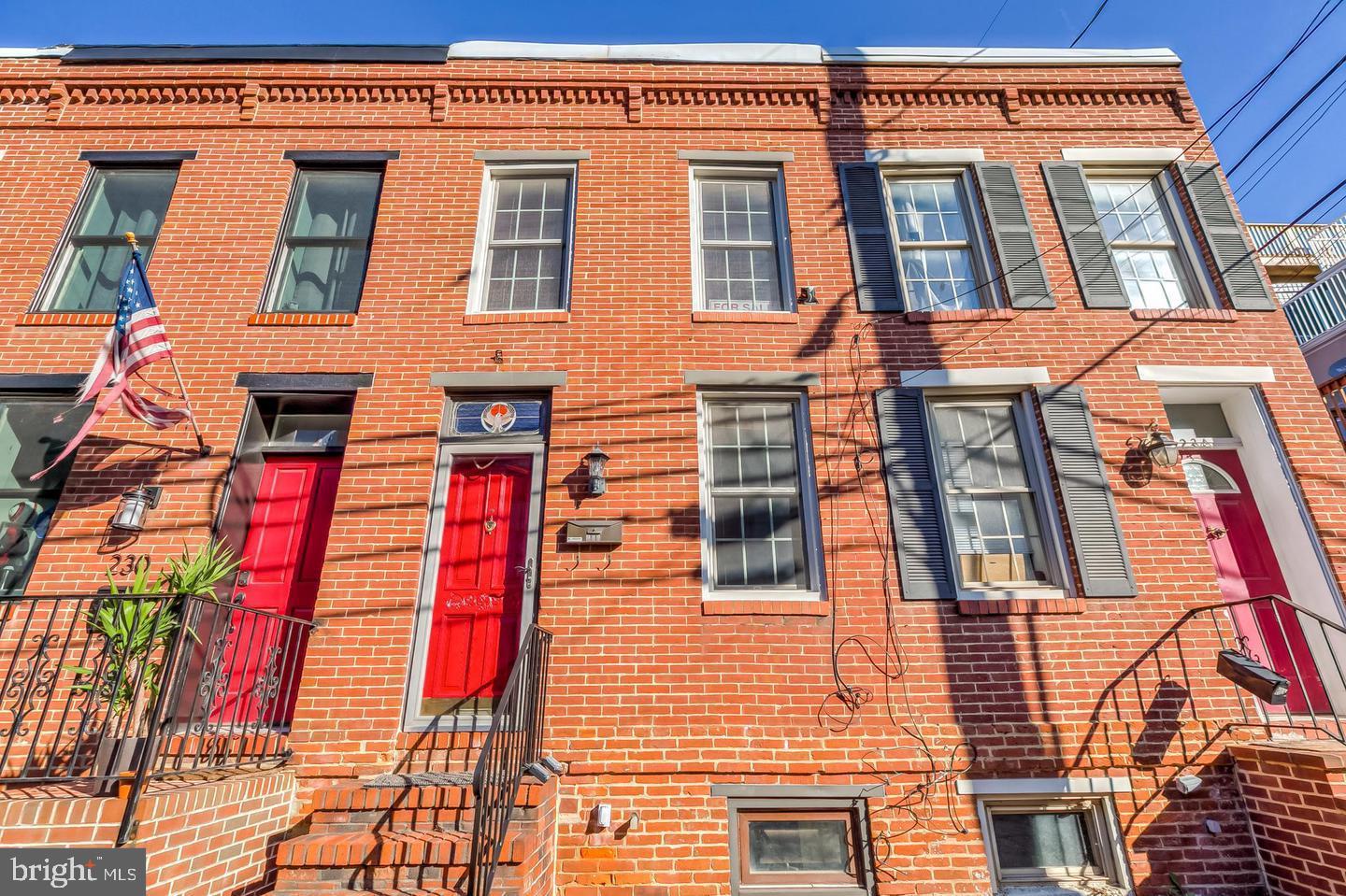 232 East Barney Street Baltimore, MD 21230 - Photo 2 of 23 a front view of a multi story residential apartment building