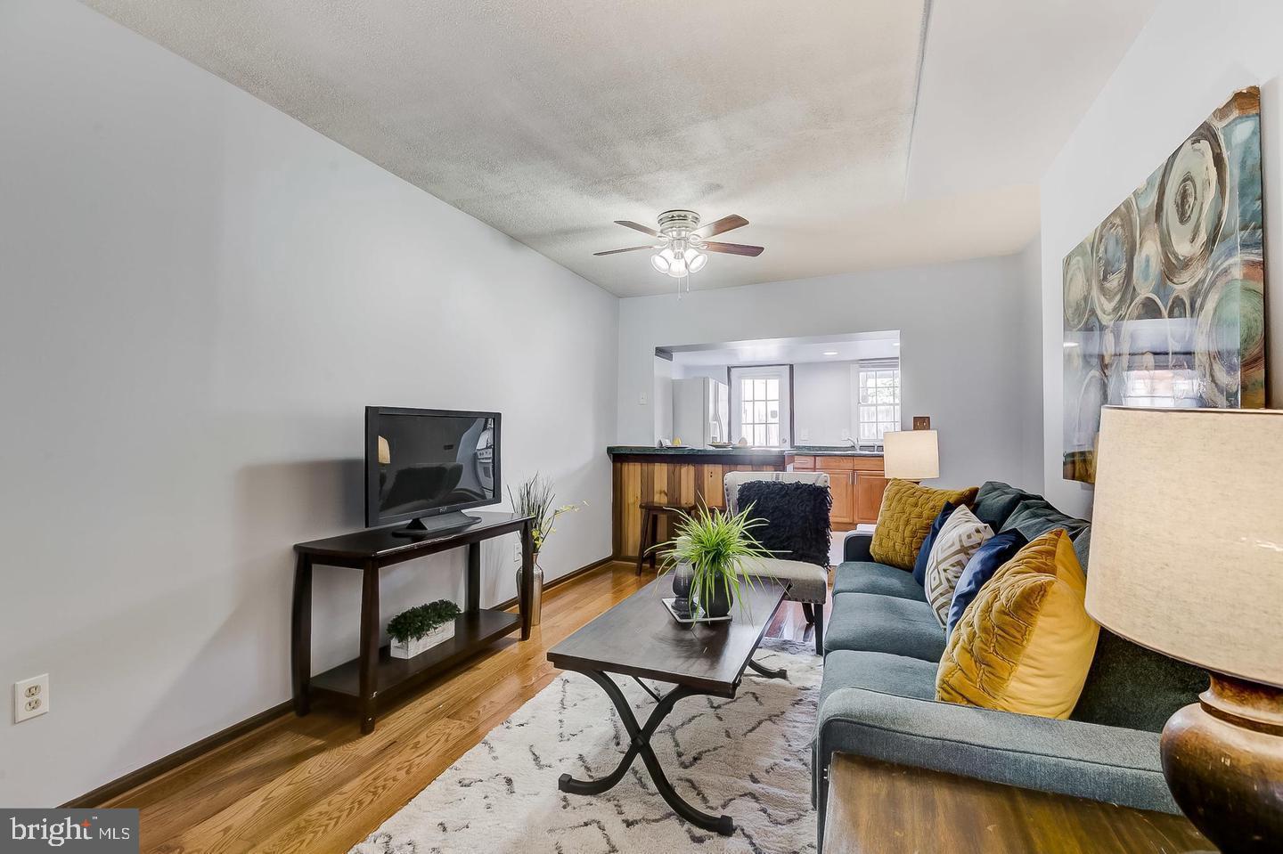 232 East Barney Street Baltimore, MD 21230 - Photo 5 of 23 a living room with furniture and a flat screen tv