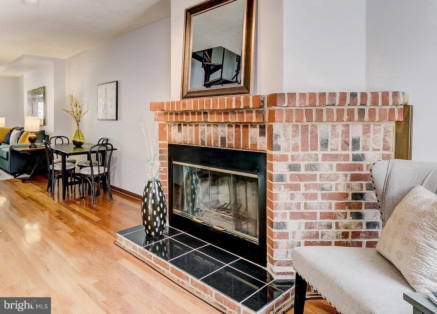 232 East Barney Street Baltimore, MD 21230 - Photo 9 of 23 a living room with furniture and a fireplace