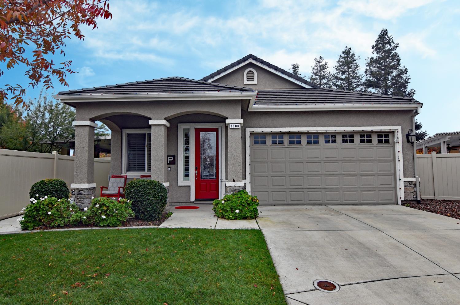 2300 State Street Turlock, CA 95380 - Photo 1 of 1 a front view of a house with garden