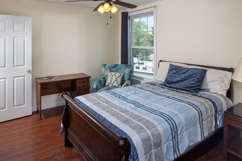 67 Newport Road Hull, MA 02045 - Photo 19 of 26 a bedroom with a bed and window