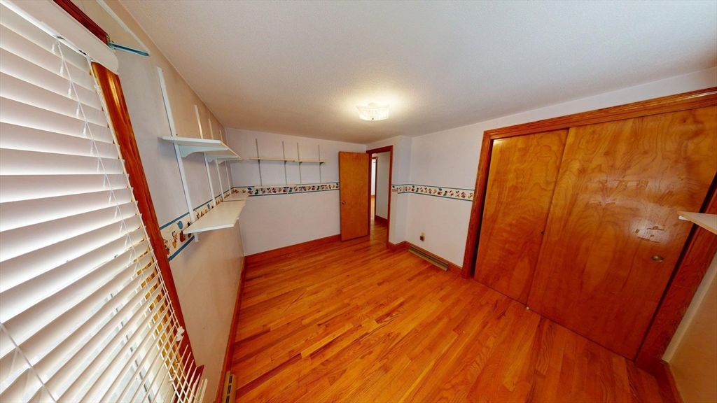 32 Morrison Court Methuen, MA 01844 - Photo 14 of 18 a view of entryway with wooden floor and stairs