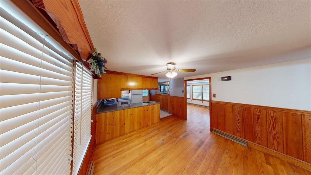 32 Morrison Court Methuen, MA 01844 - Photo 5 of 18 a view of a living room with furniture and a kitchen view