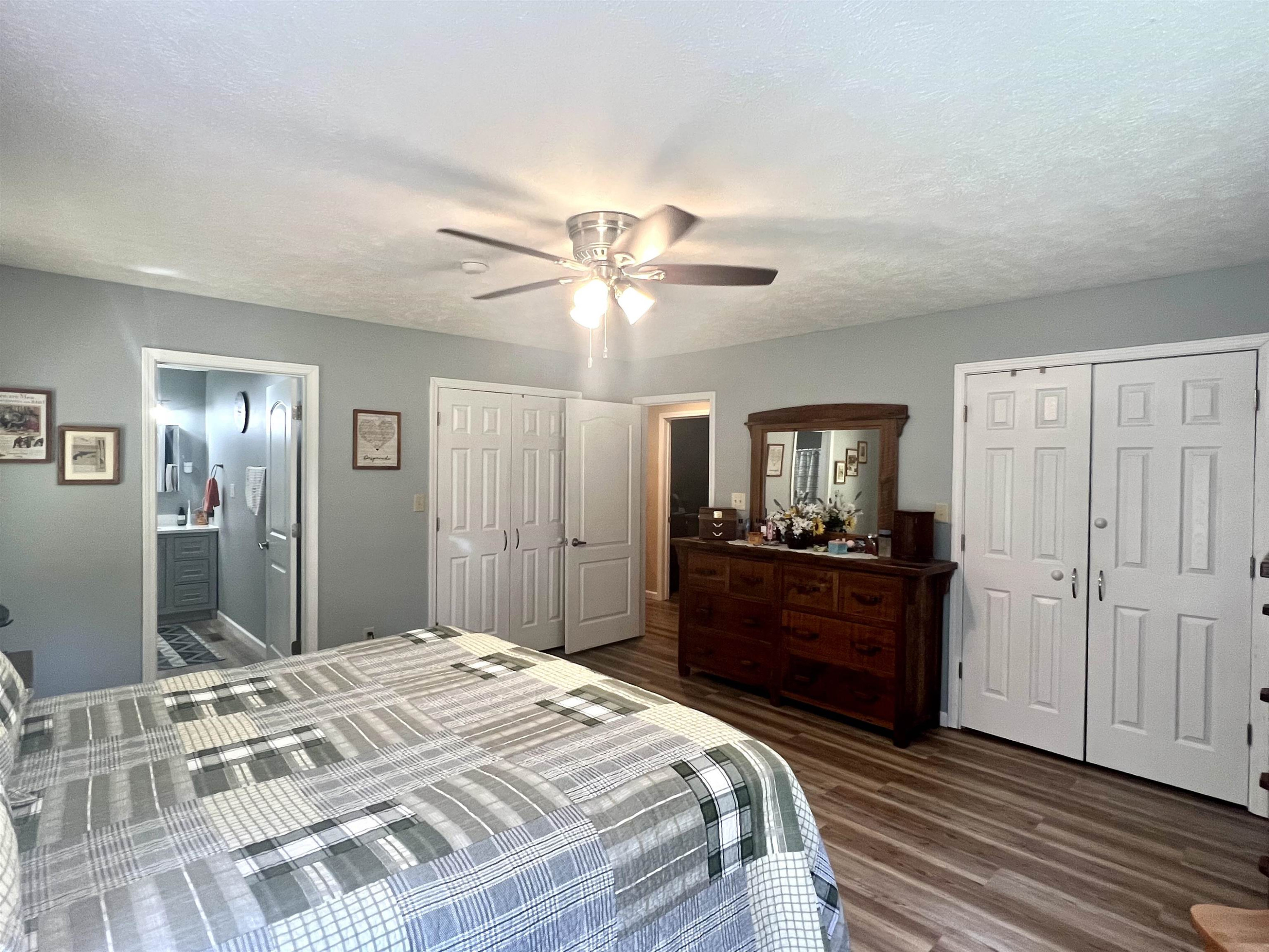 235 Willis Road Sardis, TN 38371 - Photo 16 of 38 a bedroom with a bed and wooden floor