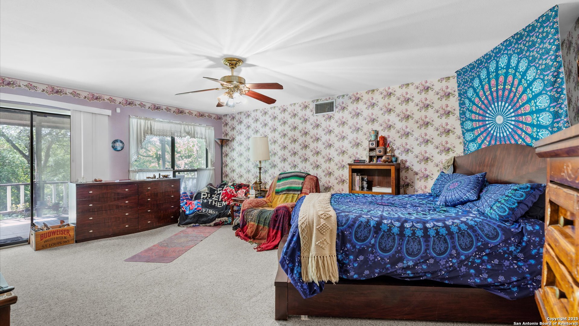 949 Burges Street Seguin, TX 78155 - Photo 11 of 26 a bed room with a bed and a fish tank