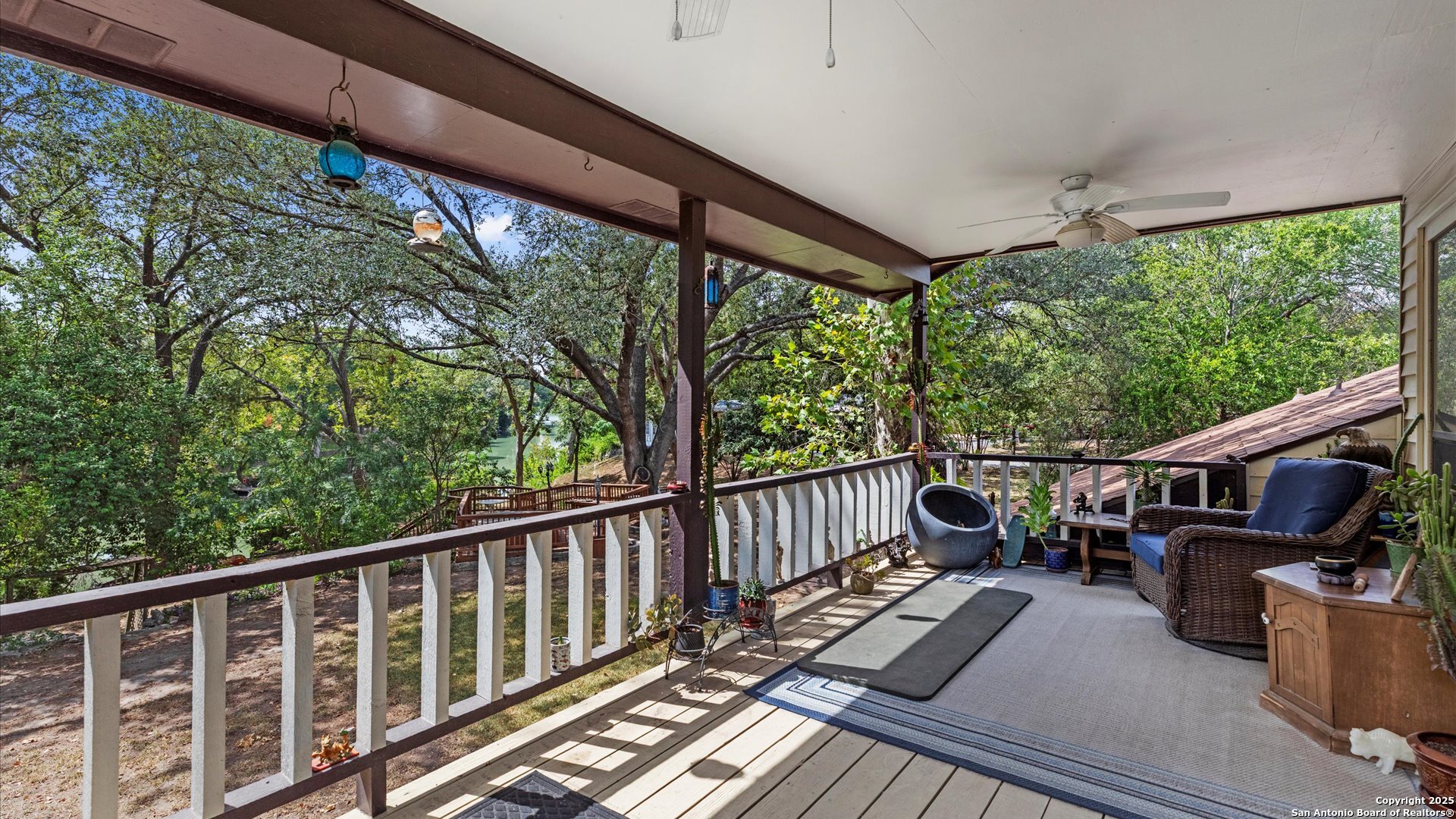 949 Burges Street Seguin, TX 78155 - Photo 12 of 26 a view of balcony with wooden floor and seating space