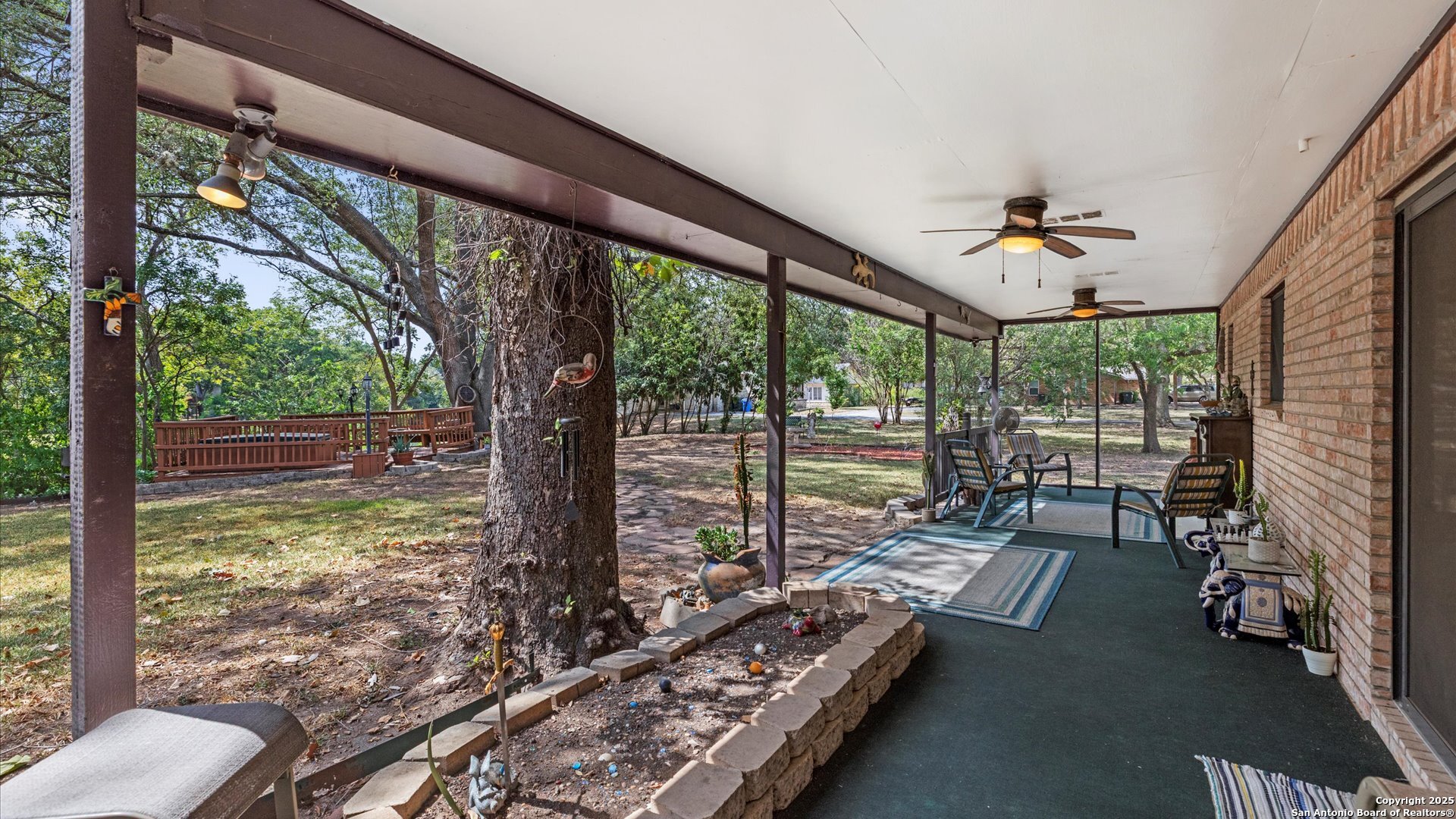 949 Burges Street Seguin, TX 78155 - Photo 22 of 26 a living room with patio area