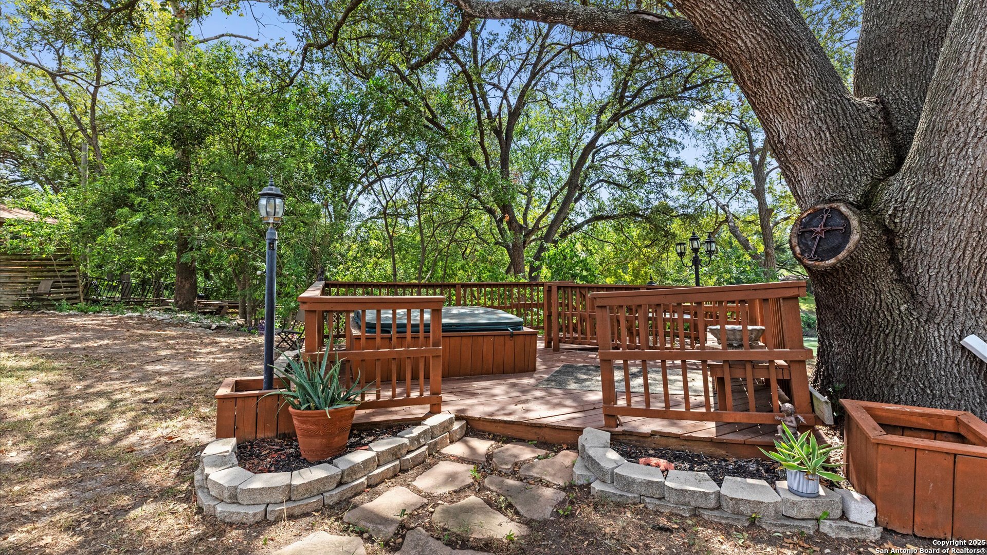 949 Burges Street Seguin, TX 78155 - Photo 23 of 26 a wooden bench sitting in front of a building