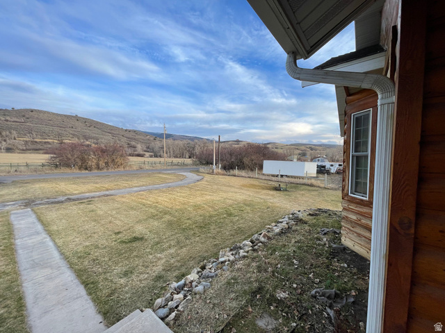 333 Lago Liberty Road Grace, ID 83241 - Photo 18 of 35 View of yard with a mountain view