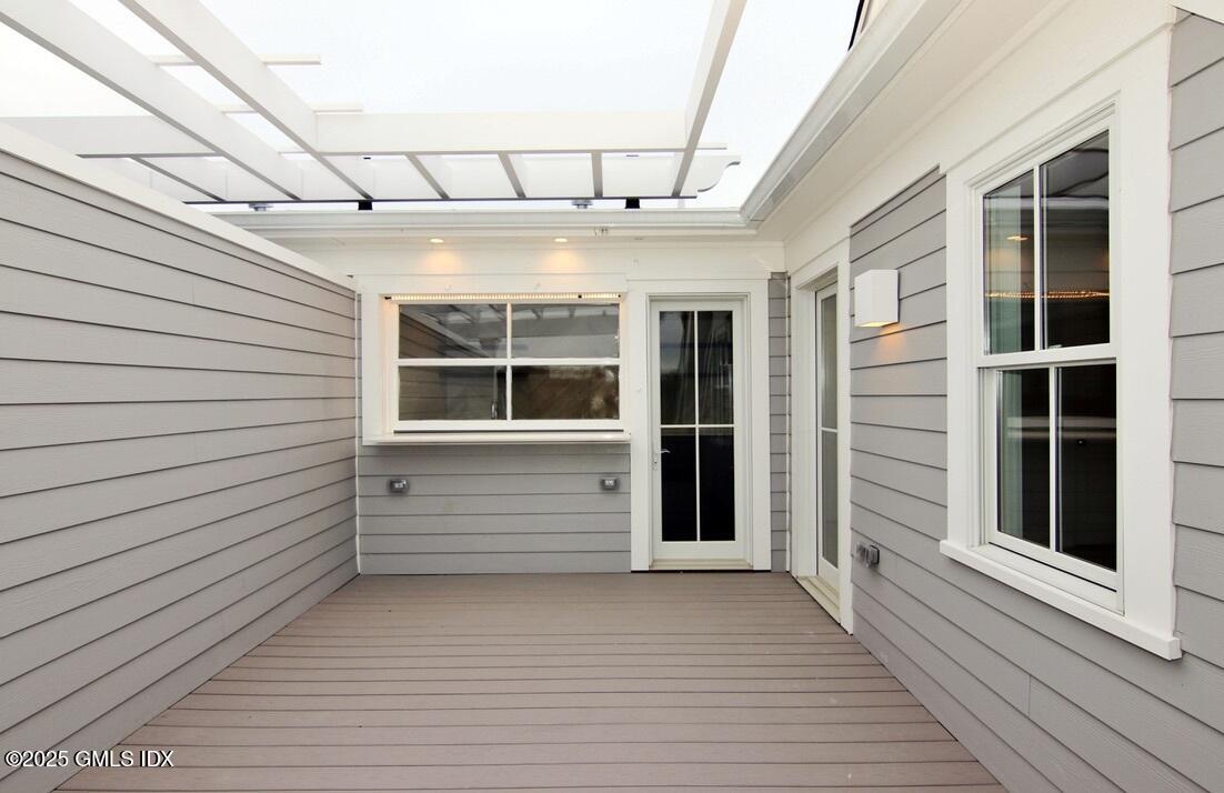 38 St Roch Avenue, Unit B Greenwich, CT 06830 - Photo 33 of 38 a view of an empty room with a window