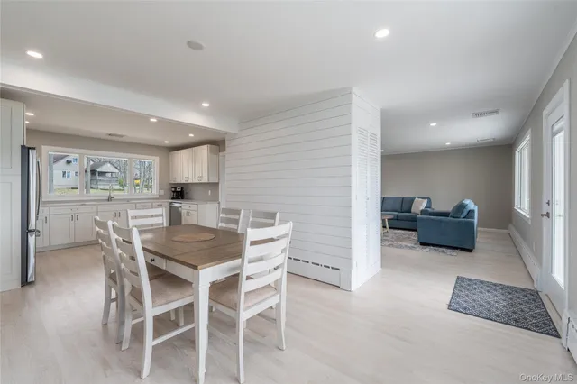a view of a dining room with furniture