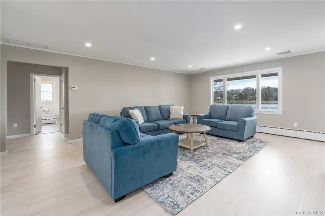 a living room with furniture and a couch