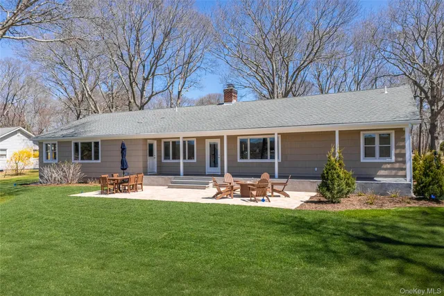 a front view of a house with patio