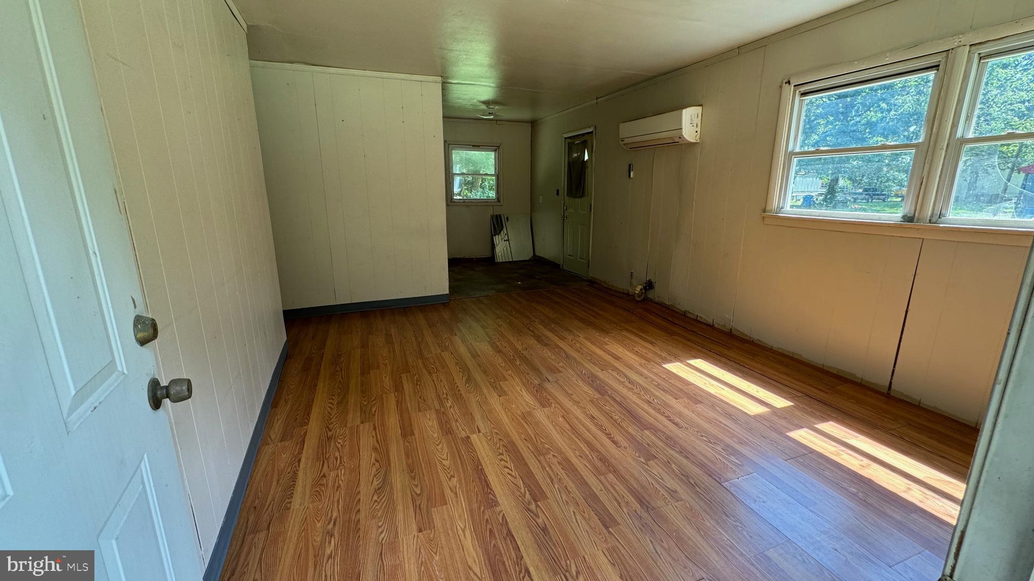 14405 Millbank Road King George, VA 22485 - Photo 12 of 20 a view of a room with wooden floor and a window