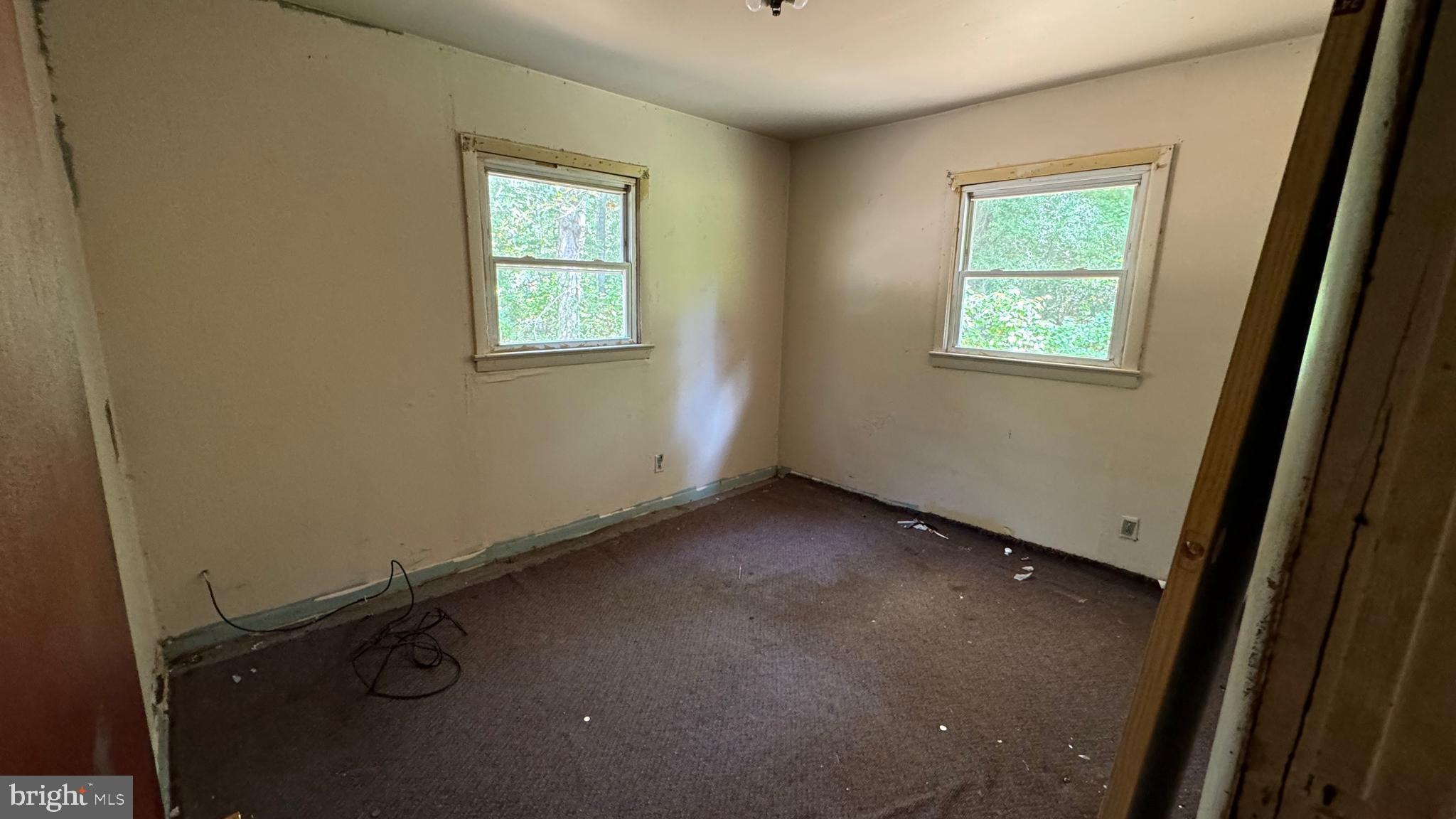 14405 Millbank Road King George, VA 22485 - Photo 14 of 20 an empty room with windows