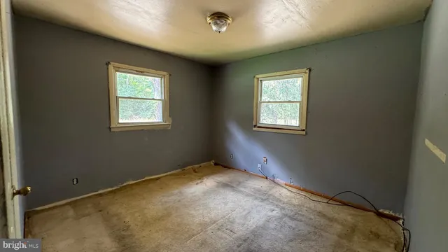 a room with sink washer and dryer