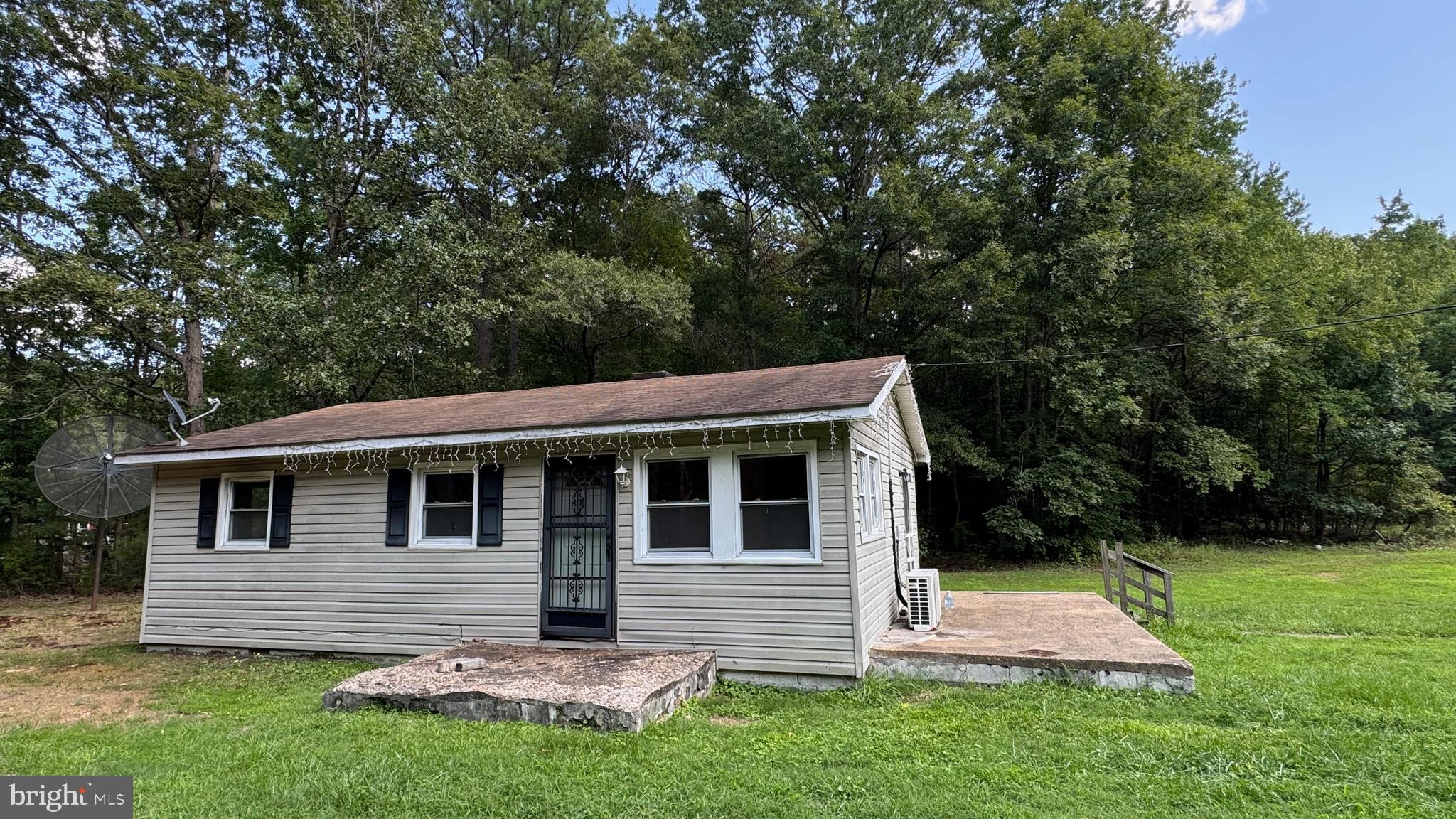 14405 Millbank Road King George, VA 22485 - Photo 7 of 20 a front view of house with yard and green space