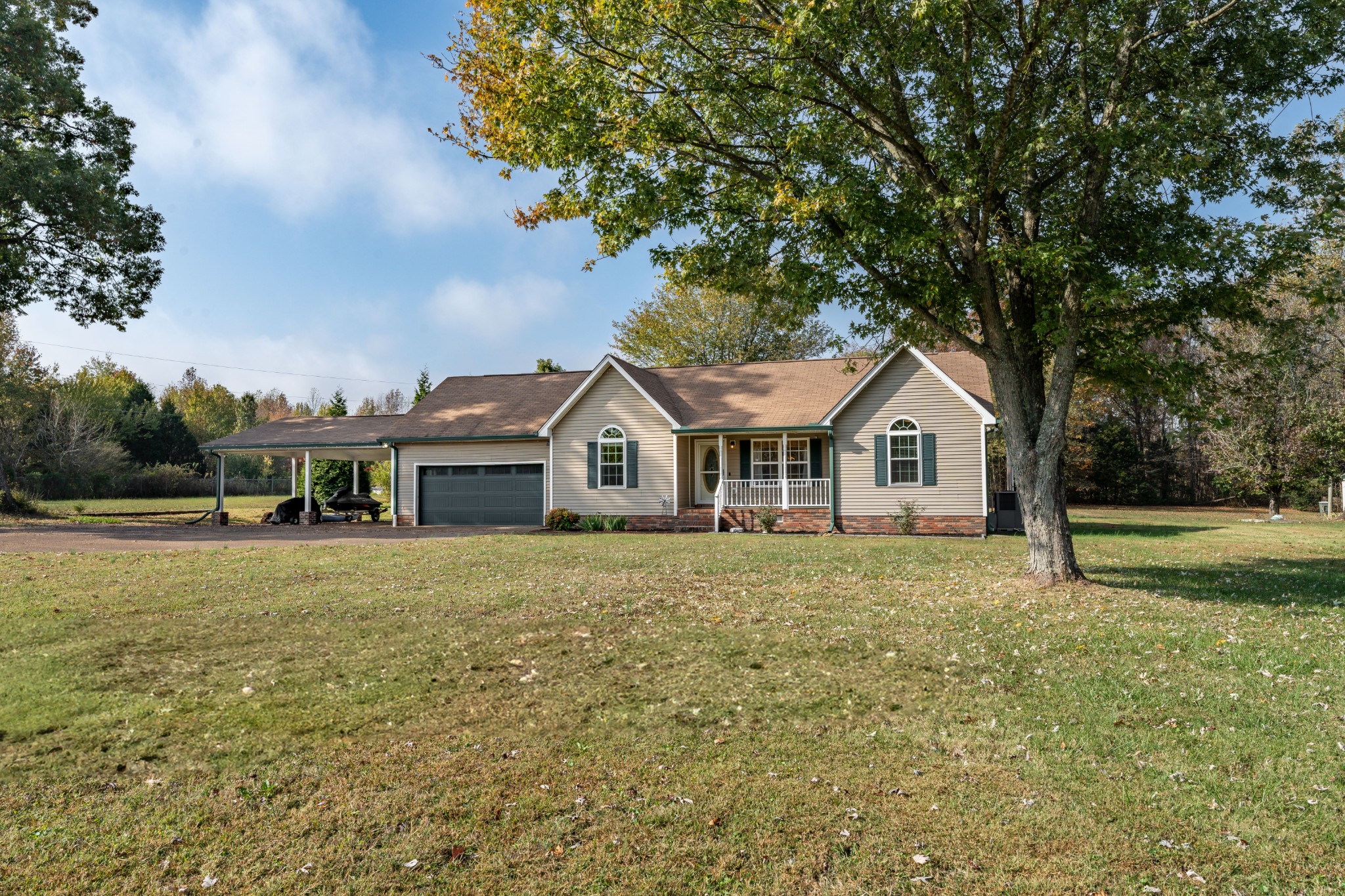 3053 Academy Road Portland, TN 37148 - Photo 1 of 45 a front view of a house with garden