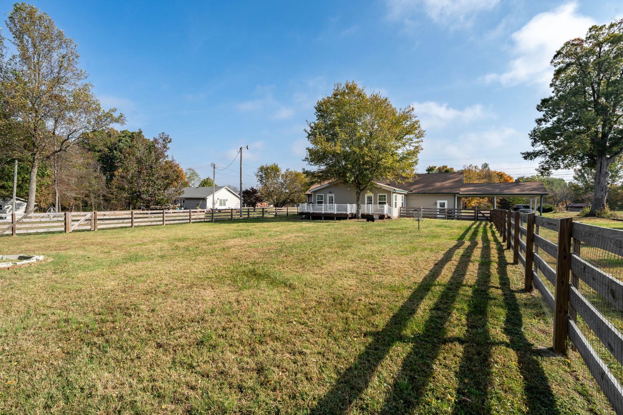 3053 Academy Road Portland, TN 37148 - Photo 15 of 45 a view of yard with swimming pool and trees