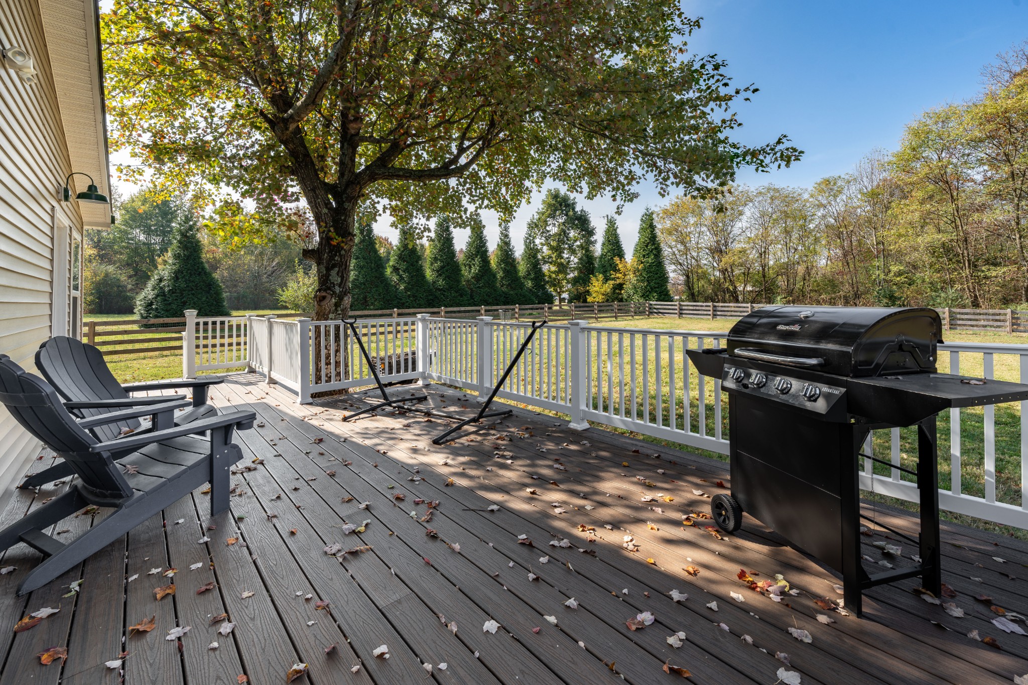 3053 Academy Road Portland, TN 37148 - Photo 19 of 45 a view of a roof deck with wooden floor and fence