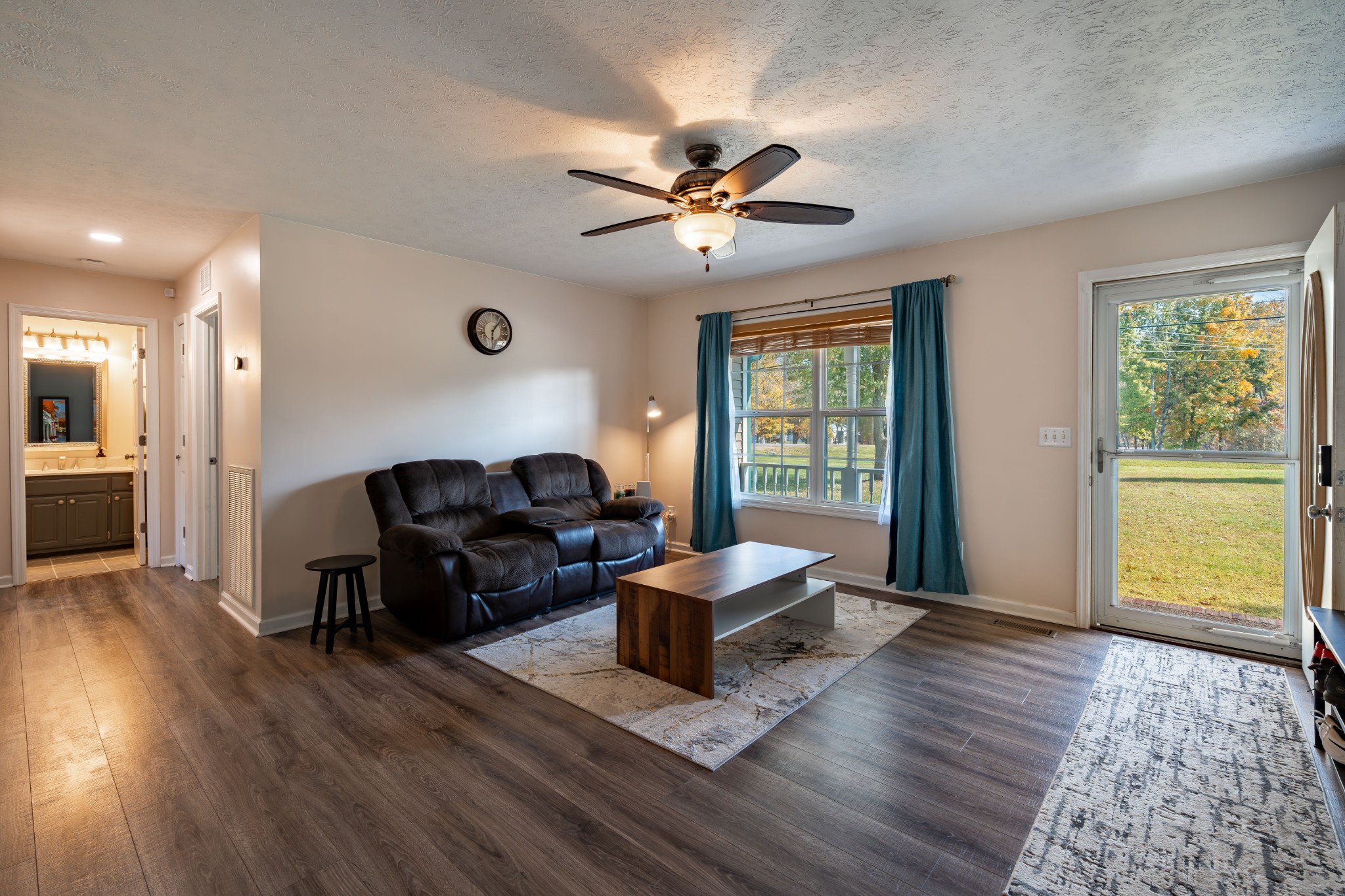 3053 Academy Road Portland, TN 37148 - Photo 22 of 45 a living room with furniture two window and wooden floor