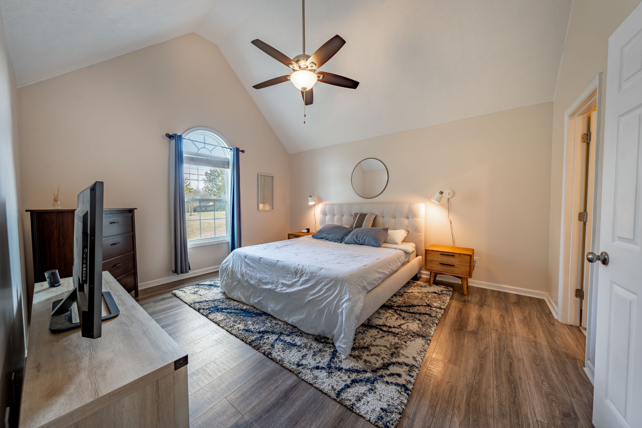 3053 Academy Road Portland, TN 37148 - Photo 33 of 45 a bedroom with a bed and wooden floor