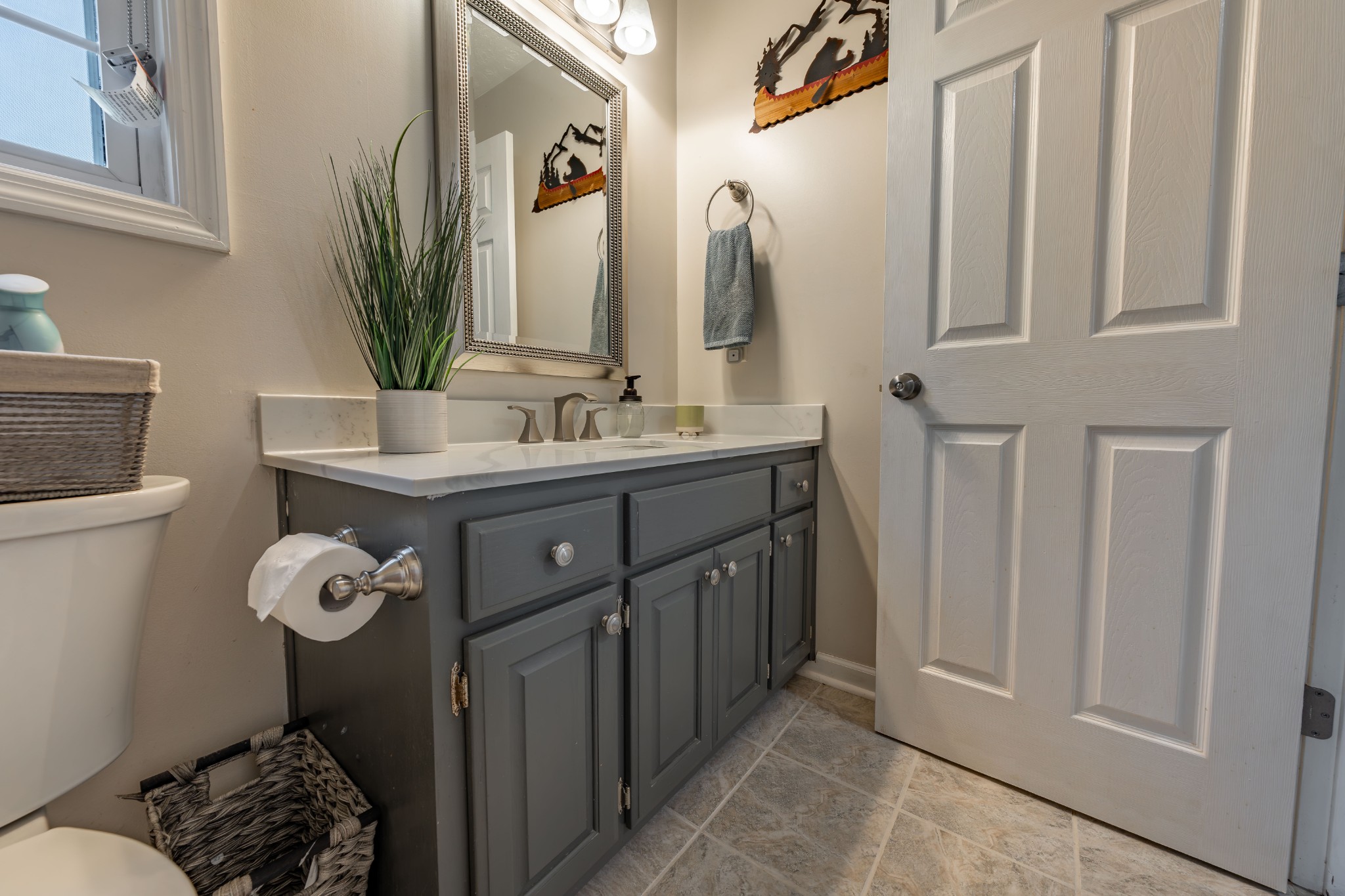 3053 Academy Road Portland, TN 37148 - Photo 43 of 45 a bathroom with a double vanity sink and a mirror