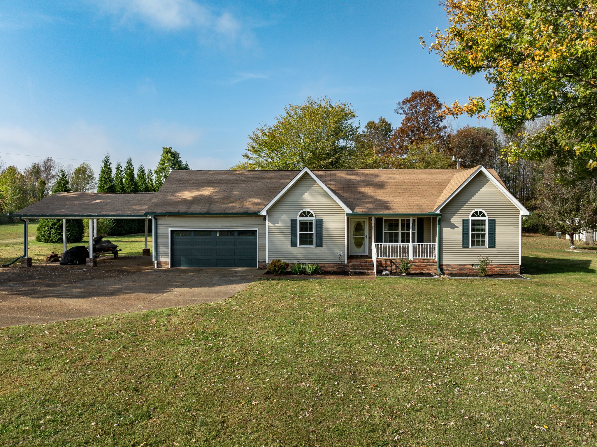 3053 Academy Road Portland, TN 37148 - Photo 10 of 45 a front view of a house with a yard