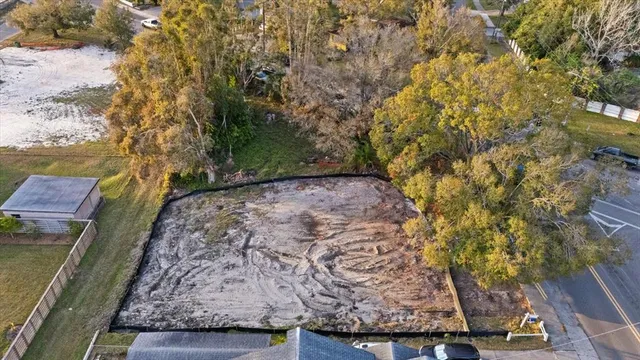 a view of a backyard of the house