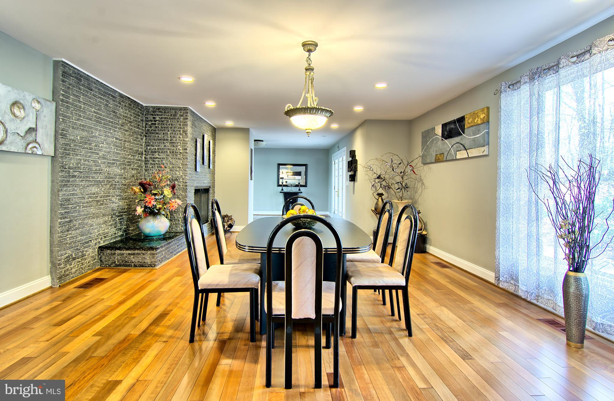 3019 Caves Road Owings Mills, MD 21117 - Photo 18 of 46 Large Open Dining Room w/ 2 Sided Fireplace