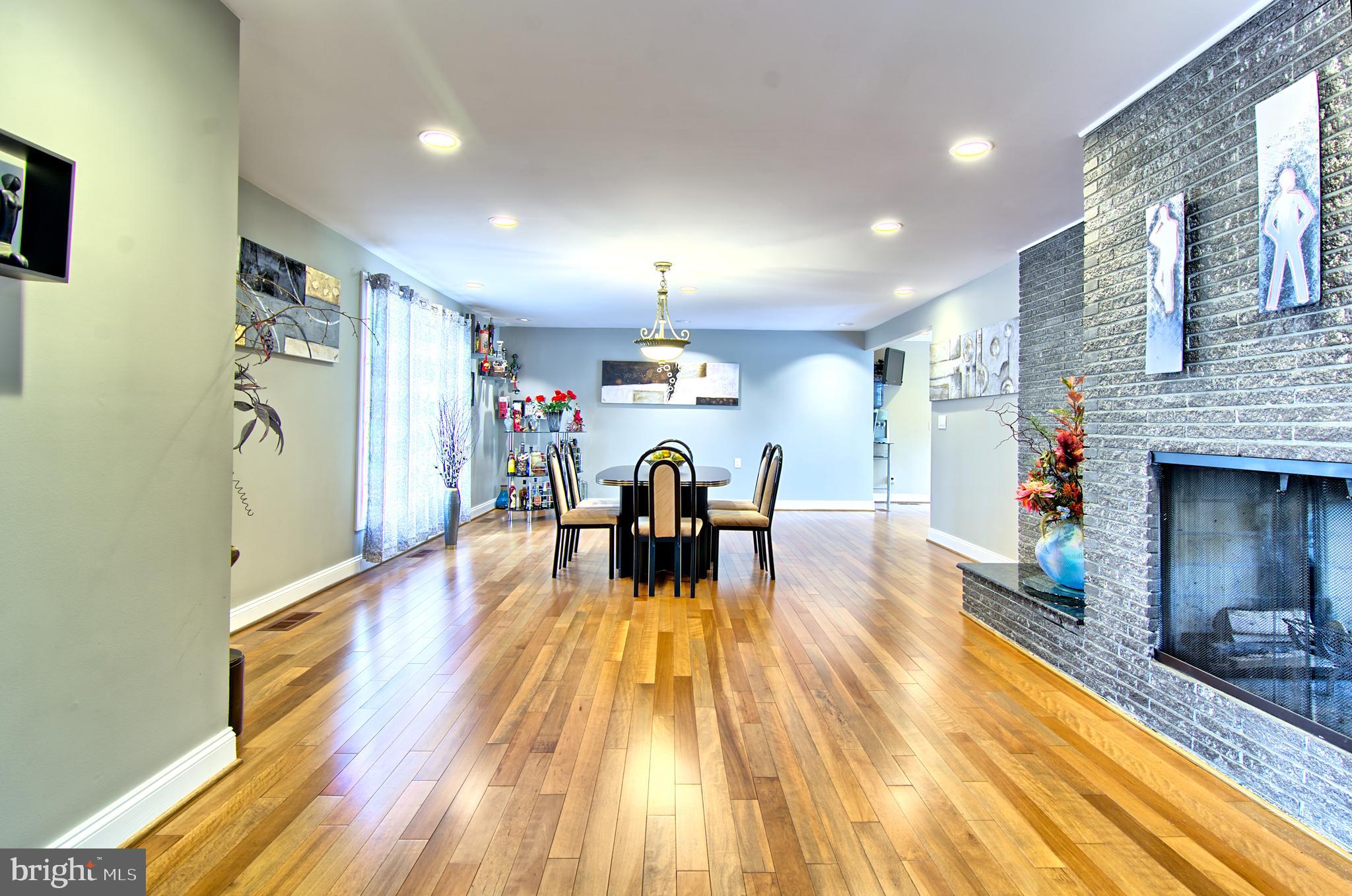 3019 Caves Road Owings Mills, MD 21117 - Photo 19 of 46 Large Open Dining Room w/ 2 Sided Fireplace