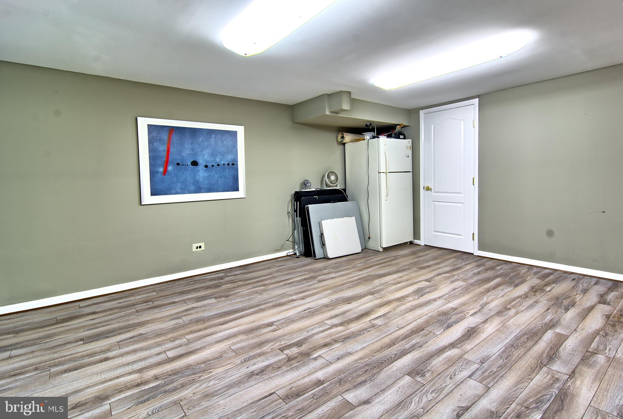 3019 Caves Road Owings Mills, MD 21117 - Photo 36 of 46 Basement w/ LVP