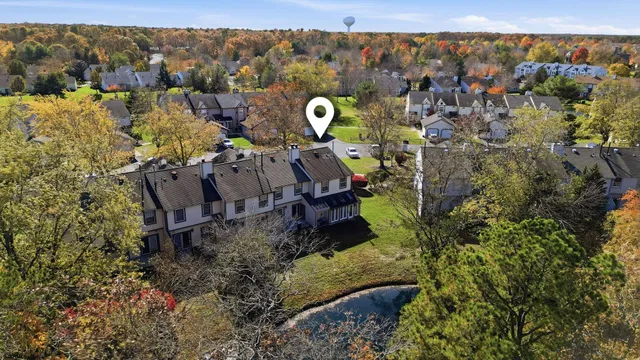 a view of a house with a mountain in the background