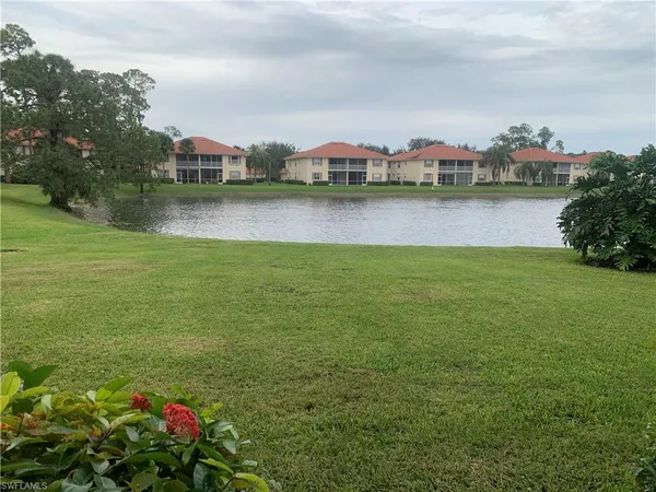 a view of a lake with houses