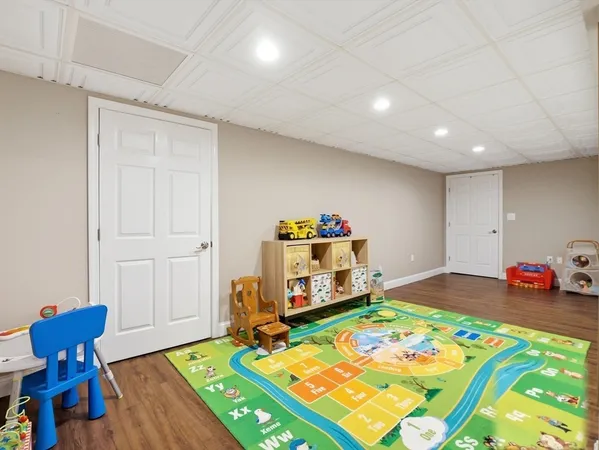 a room with furniture and a wooden floor