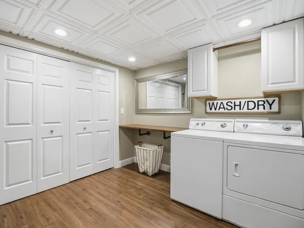 a utility room with washer and dryer