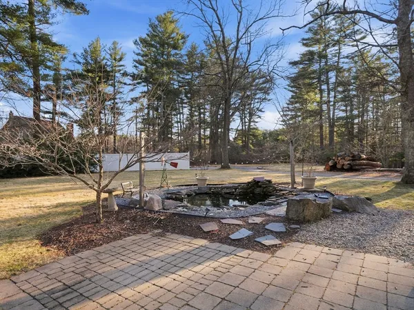 a front view of a house with a swimming pool